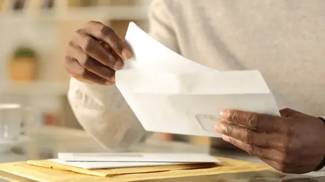 person opening mail