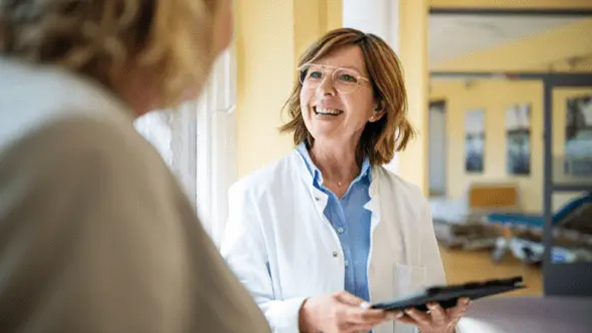 Female doctor with patient