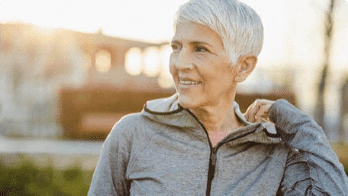 senior woman walking outdoors