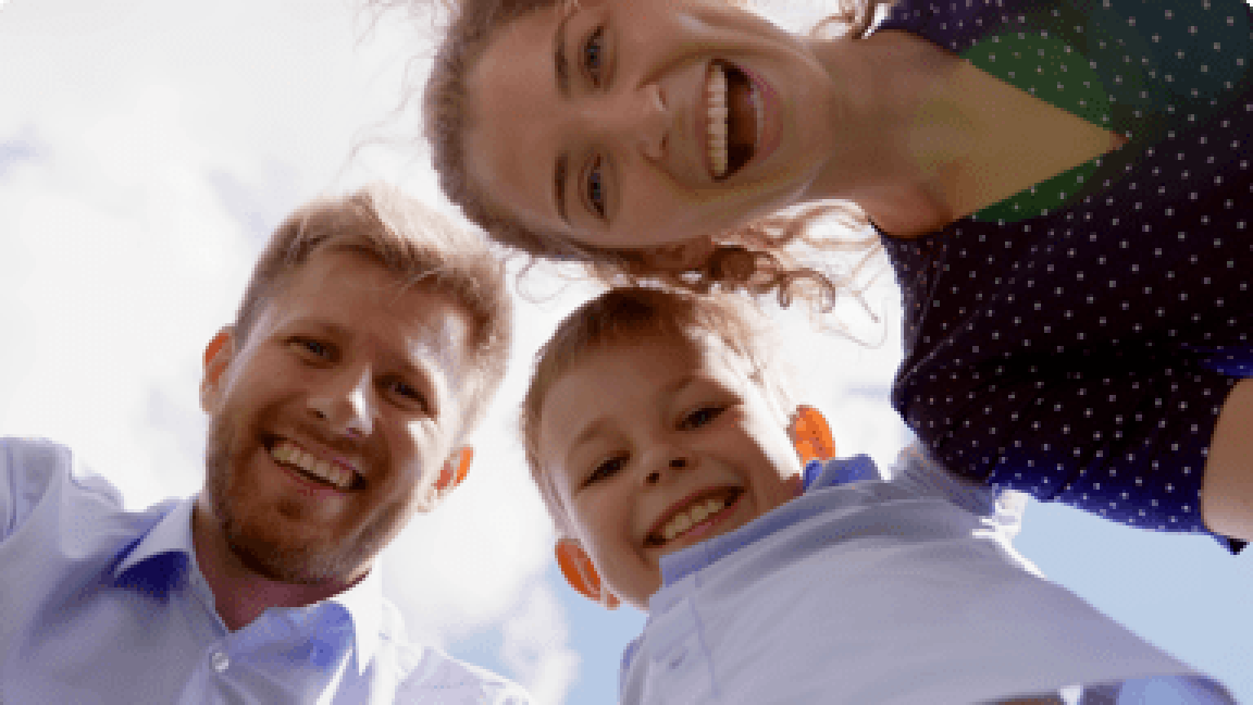 family looking down to take a selfie