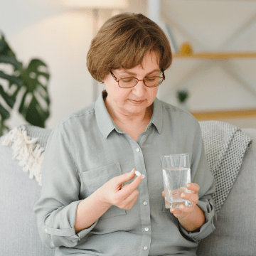 lady taking a pill