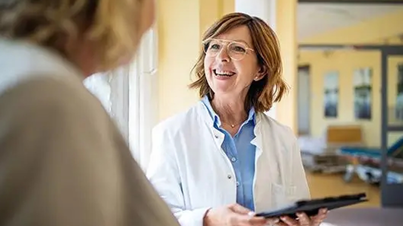 Female doctor with patient