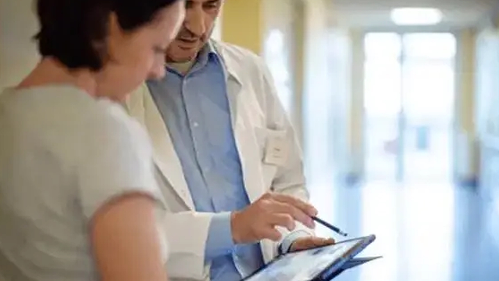 Male doctor with patient