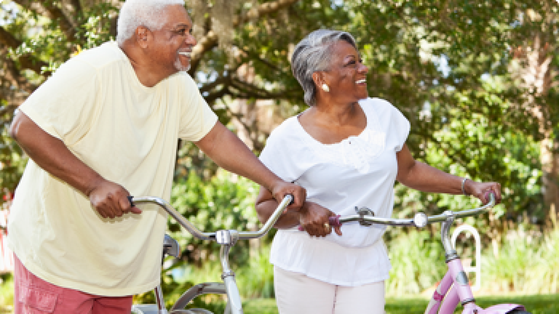 senior couple riding bycicles