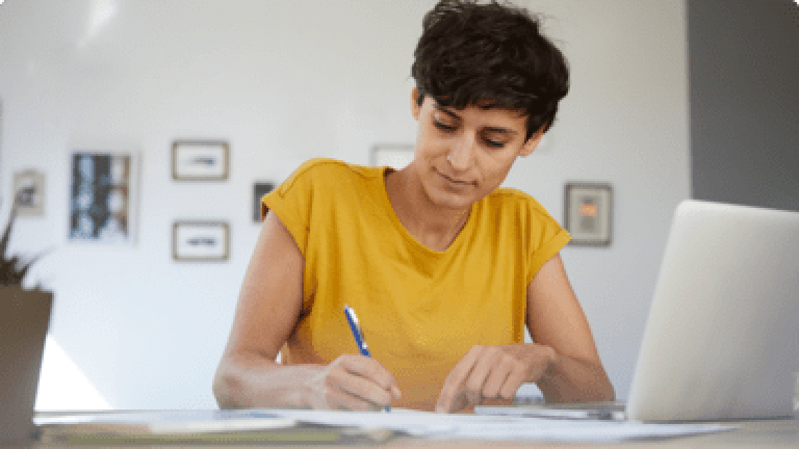 young woman writing 